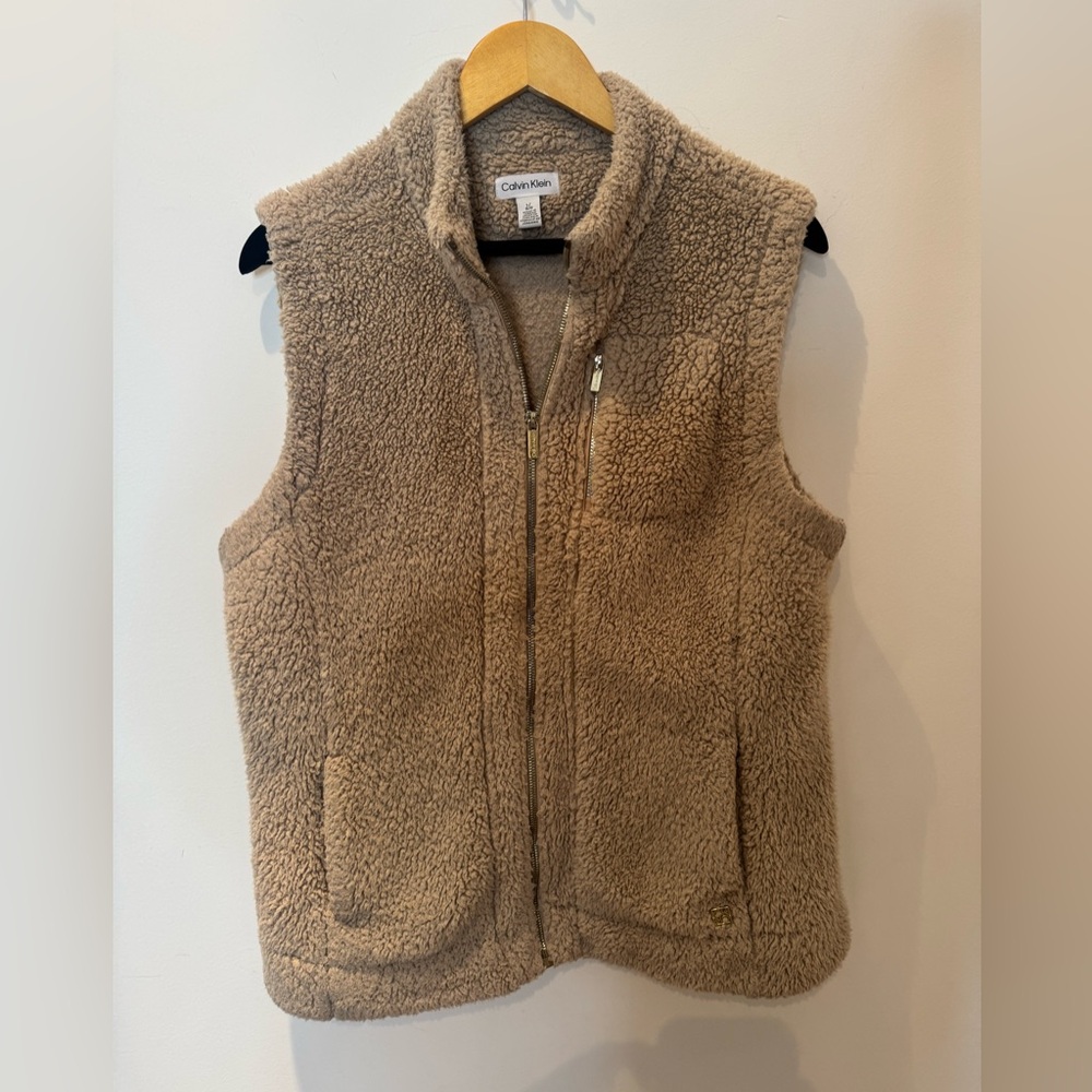 Calvin Klein beige vest with gold hardware. Size L.
